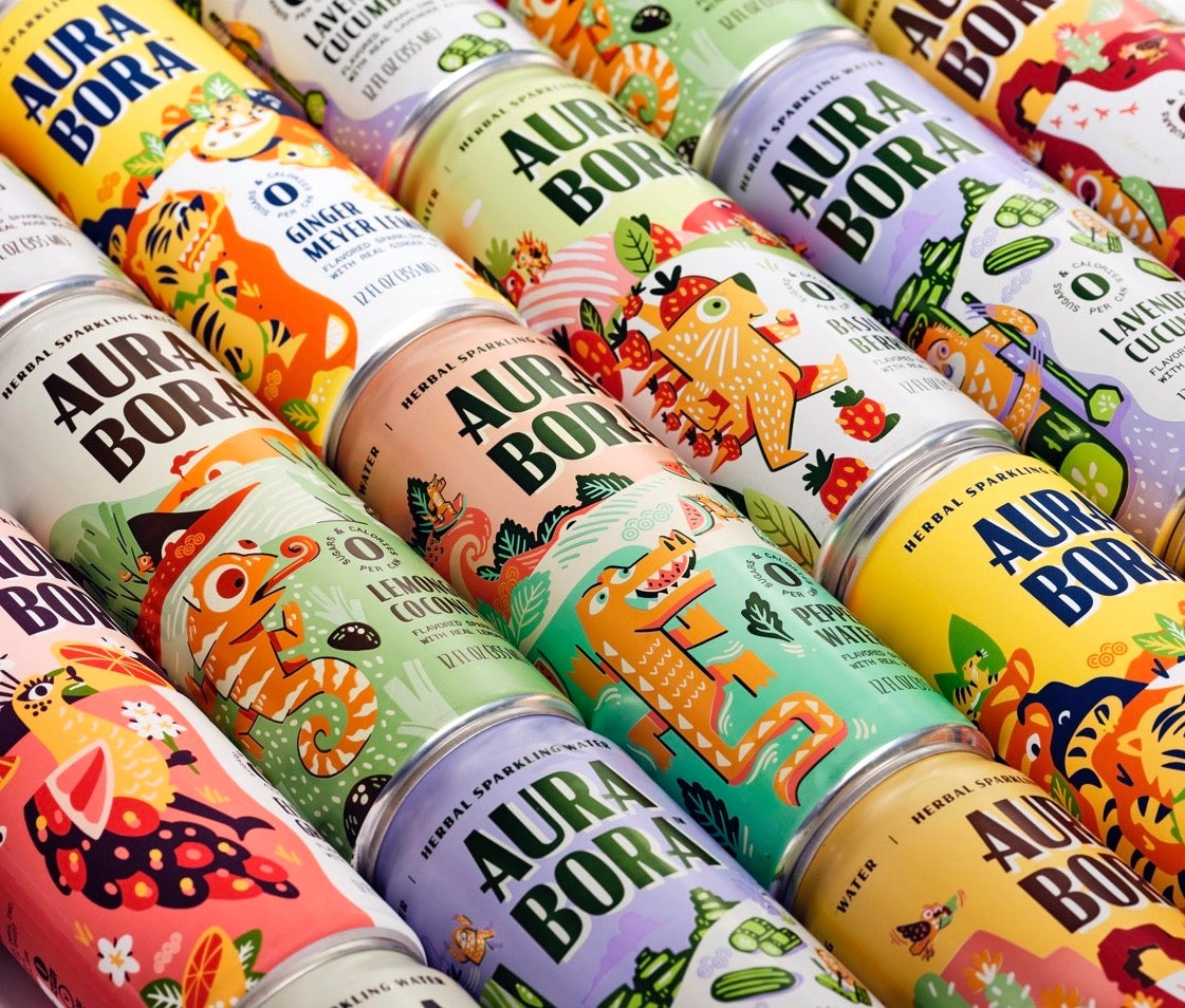Aura Bora cans lined up on their sides