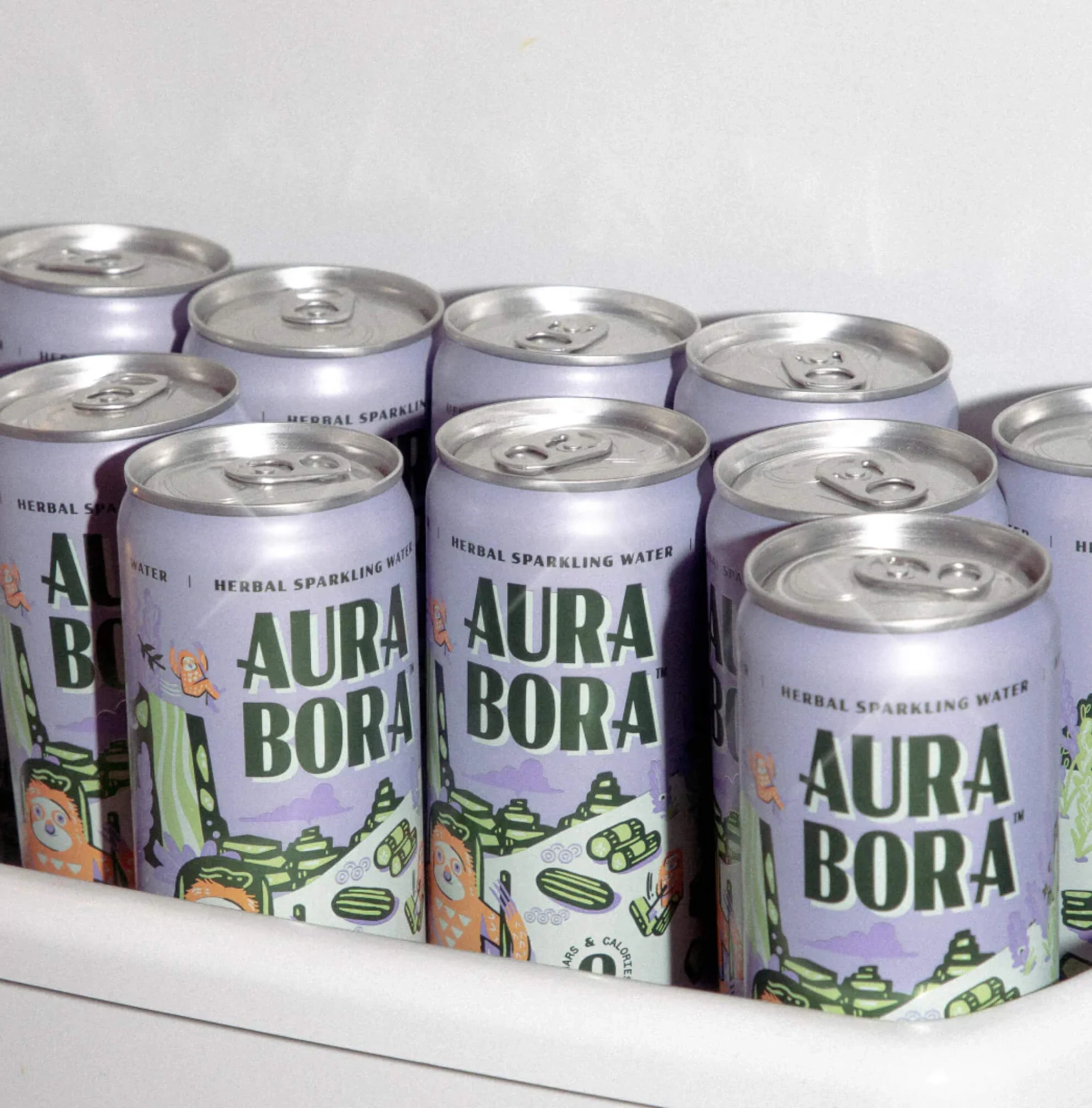 Fridge shelf stocked with Aura Bora sparkling water